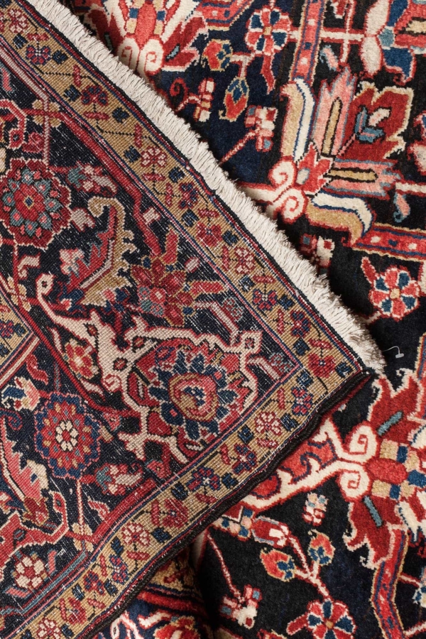 Old Persian Heriz Carpet at Essie Carpets, Mayfair London