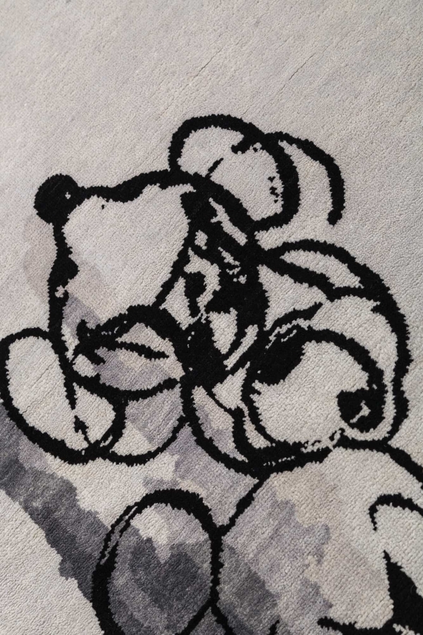Several Mickey Characters along one Edge Rug at Essie Carpets, Mayfair London