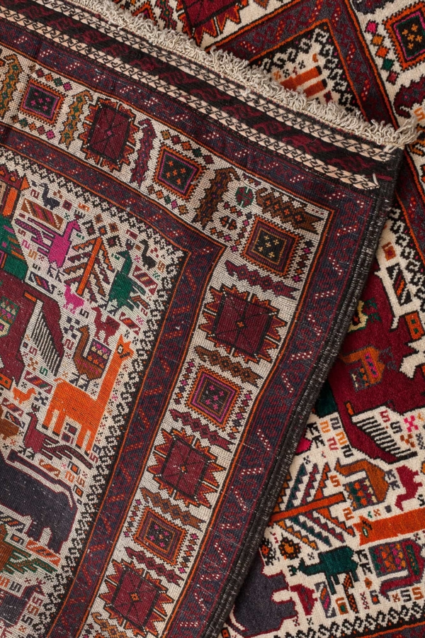 Old Baluch Rug at Essie Carpets, Mayfair London