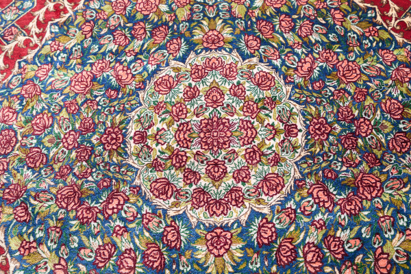 Persian Qum Pure Silk Carpet - Very Fine - Signed - Central Medallion with floral motif throughout Approx 3x2m (10x7ft) Light complexion in red.