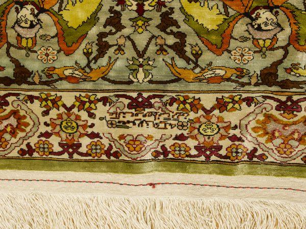 Hereke silk and metal thread rug